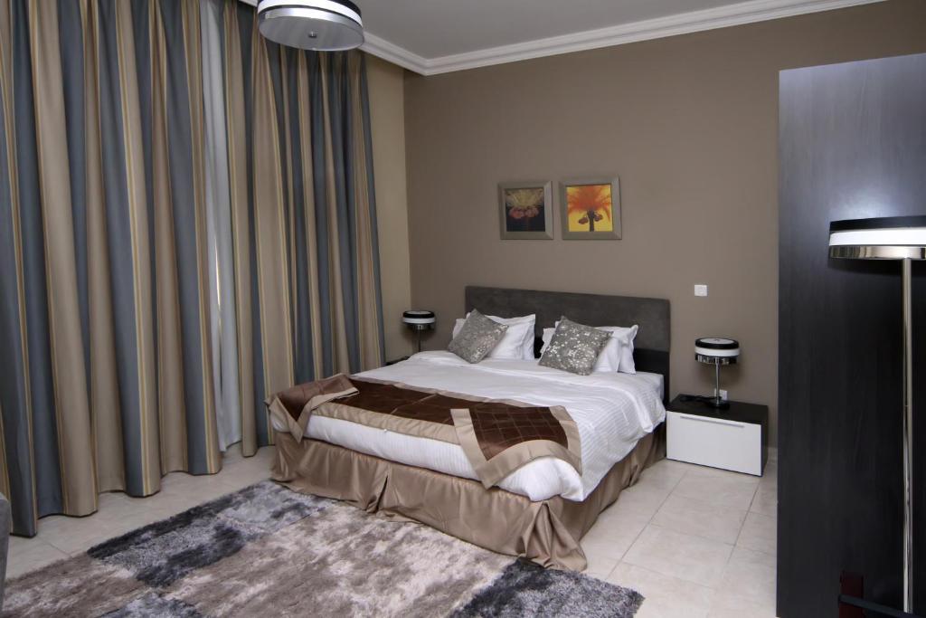 Magnum Hotel & Suites West Bay Doha Rom bilde